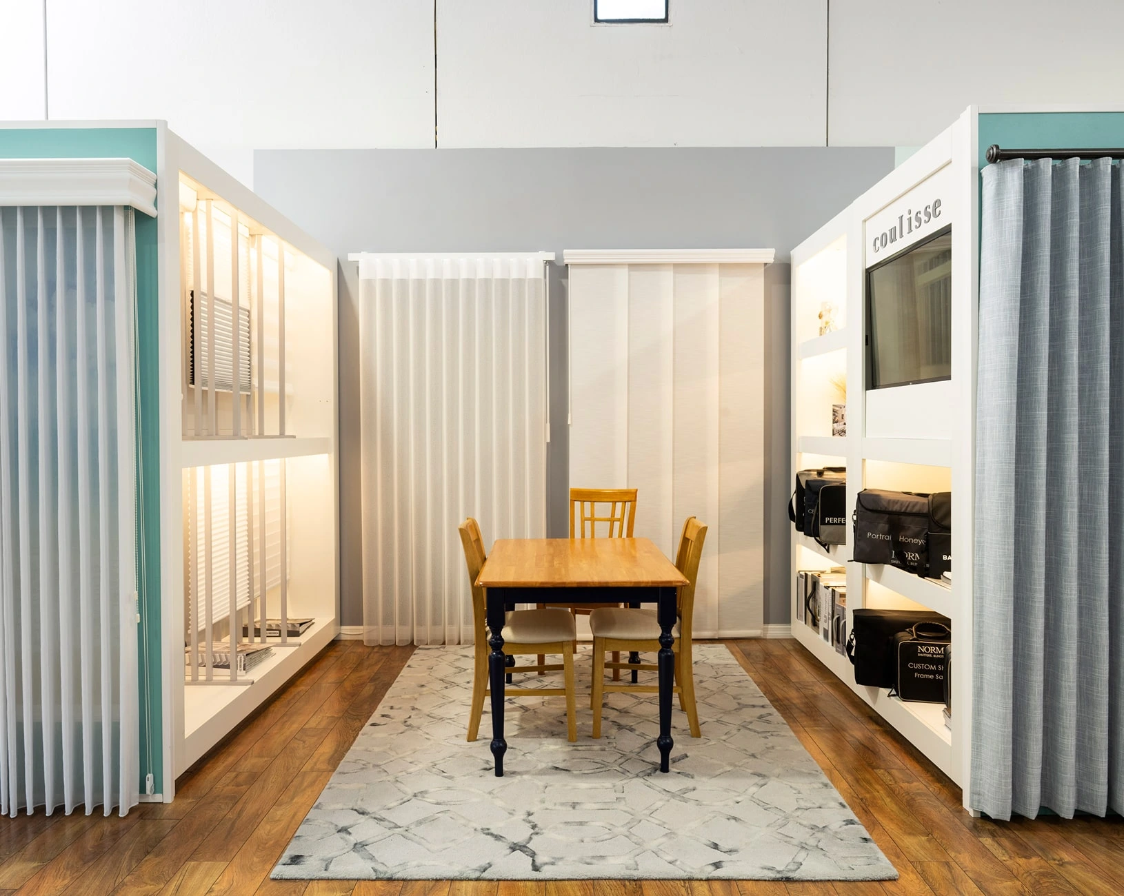 Modern room with wooden table and chairs.